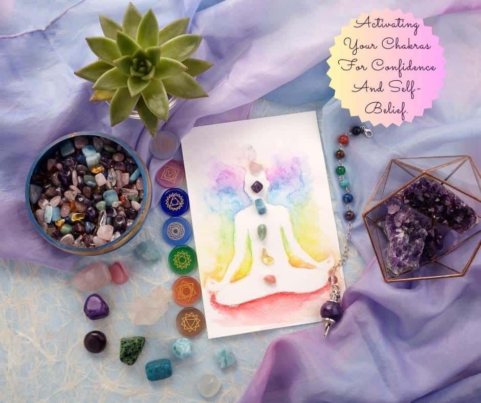 A picture of chakra stones placed in position on a drawn body with a text bubble that says Activating your chakras for confidence and self belief